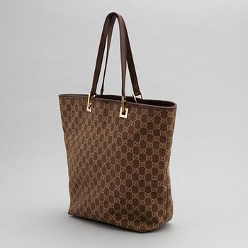 Gucci, a monogram canvas handbag.