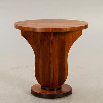 An Art deco style walnut table later part of the 20th century.