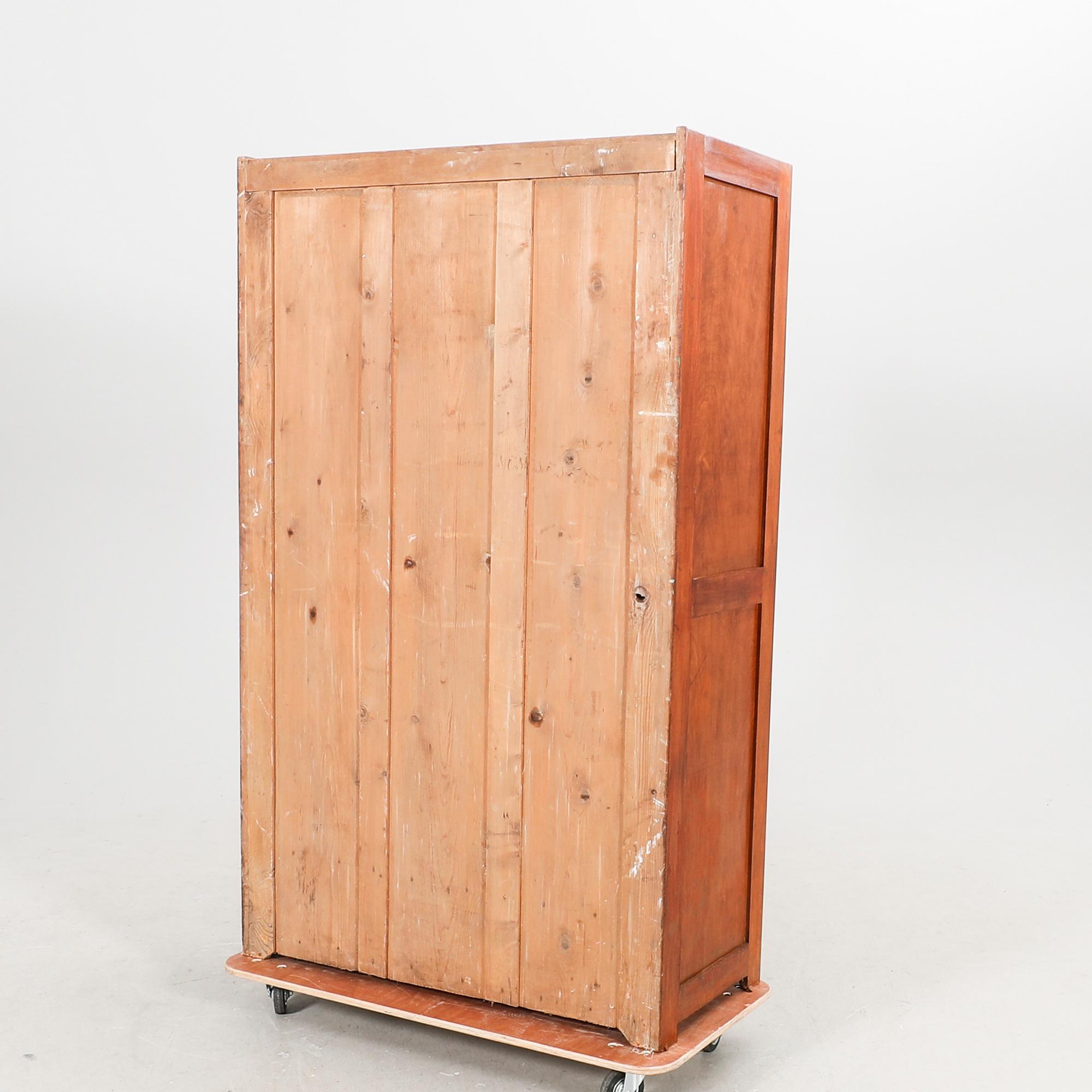 A 1930/40s walnut wardrobe.