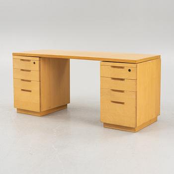 Alvar Aalto, a birch writing desk for Artek, Finland, second half of the 20th century.