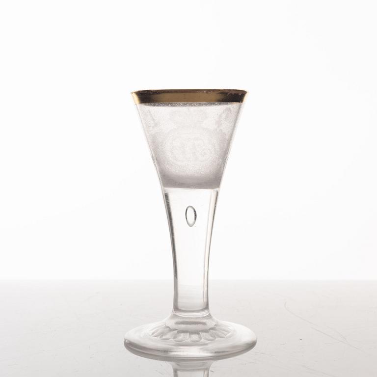 A presumably German engraved and gilt rococo glass, mid 18th century.
