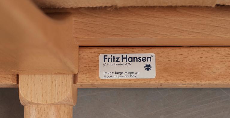 A Børge Mogensen beech and red brown leather sofa, Fritz Hansen 1996, model 1758.