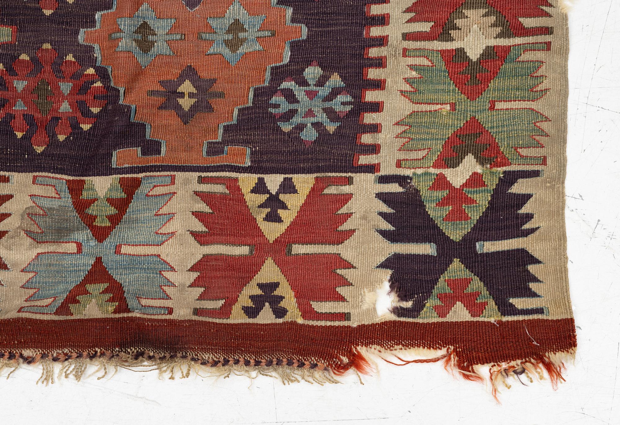 An antique kilim fragment, central Anatolia, c. 238 x 82 cm.