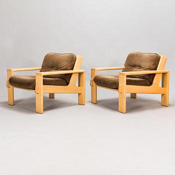 Esko Pajamies, A pair of 1970's 'Bonanza' armchairs, coffee table and sofa for Asko.