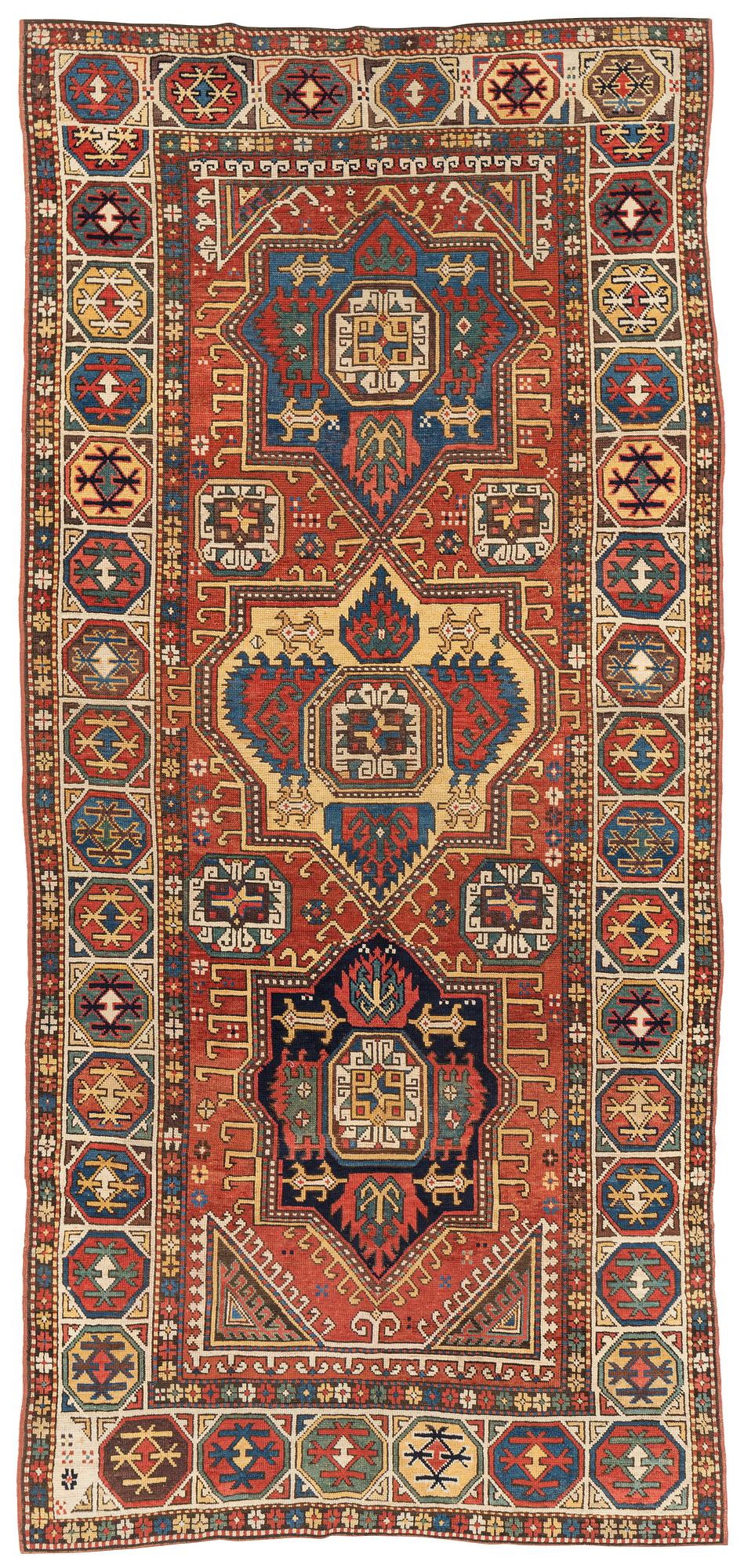 An antique Konya long rug, c. 324 x 144 cm.