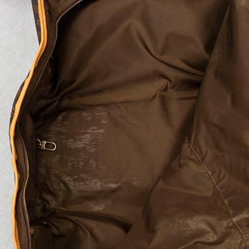 LOUIS VUITTON, a monogram canvas garment bag.