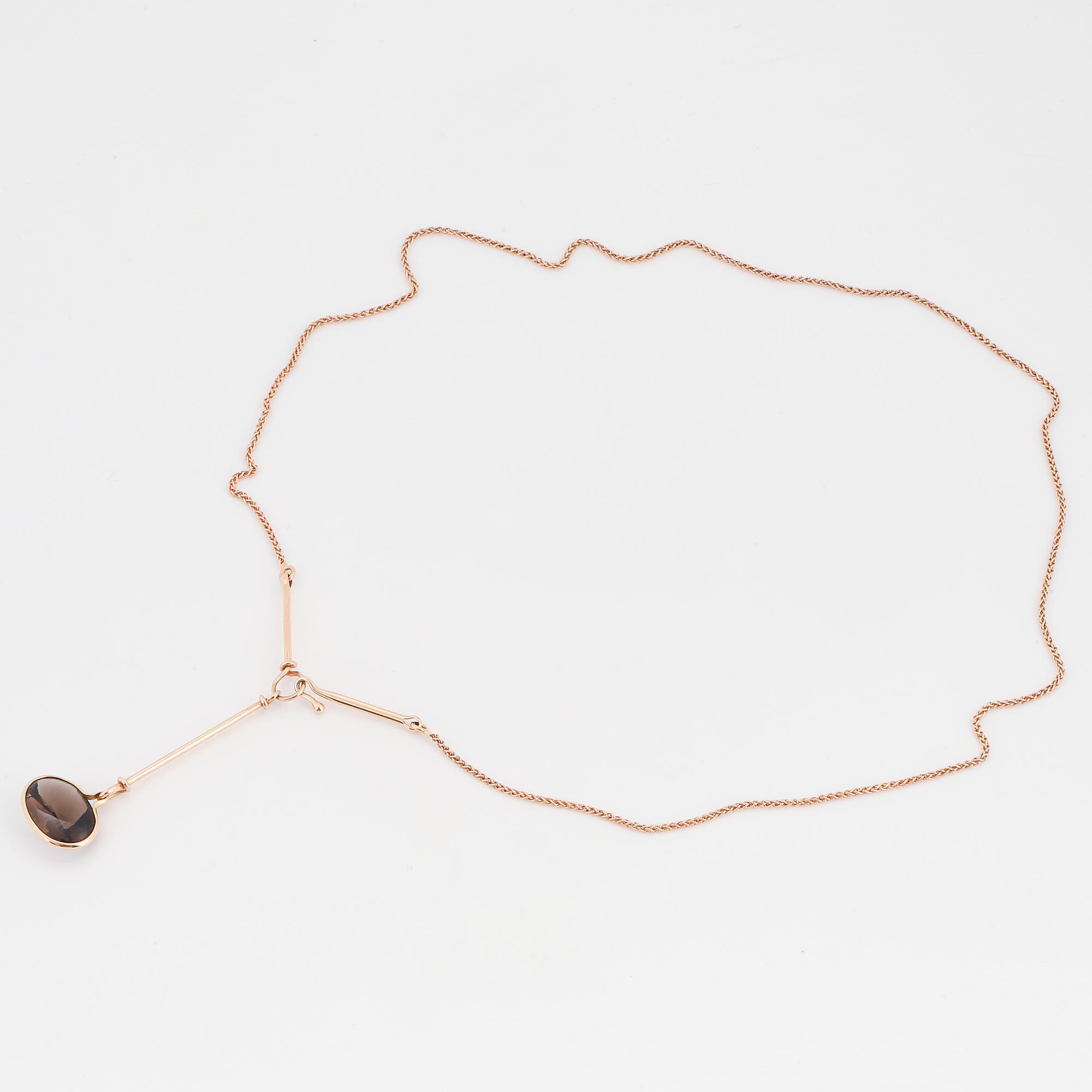 GEORG JENSEN, a "Savannah" pendant set with an oval faceted smoky quatrz.