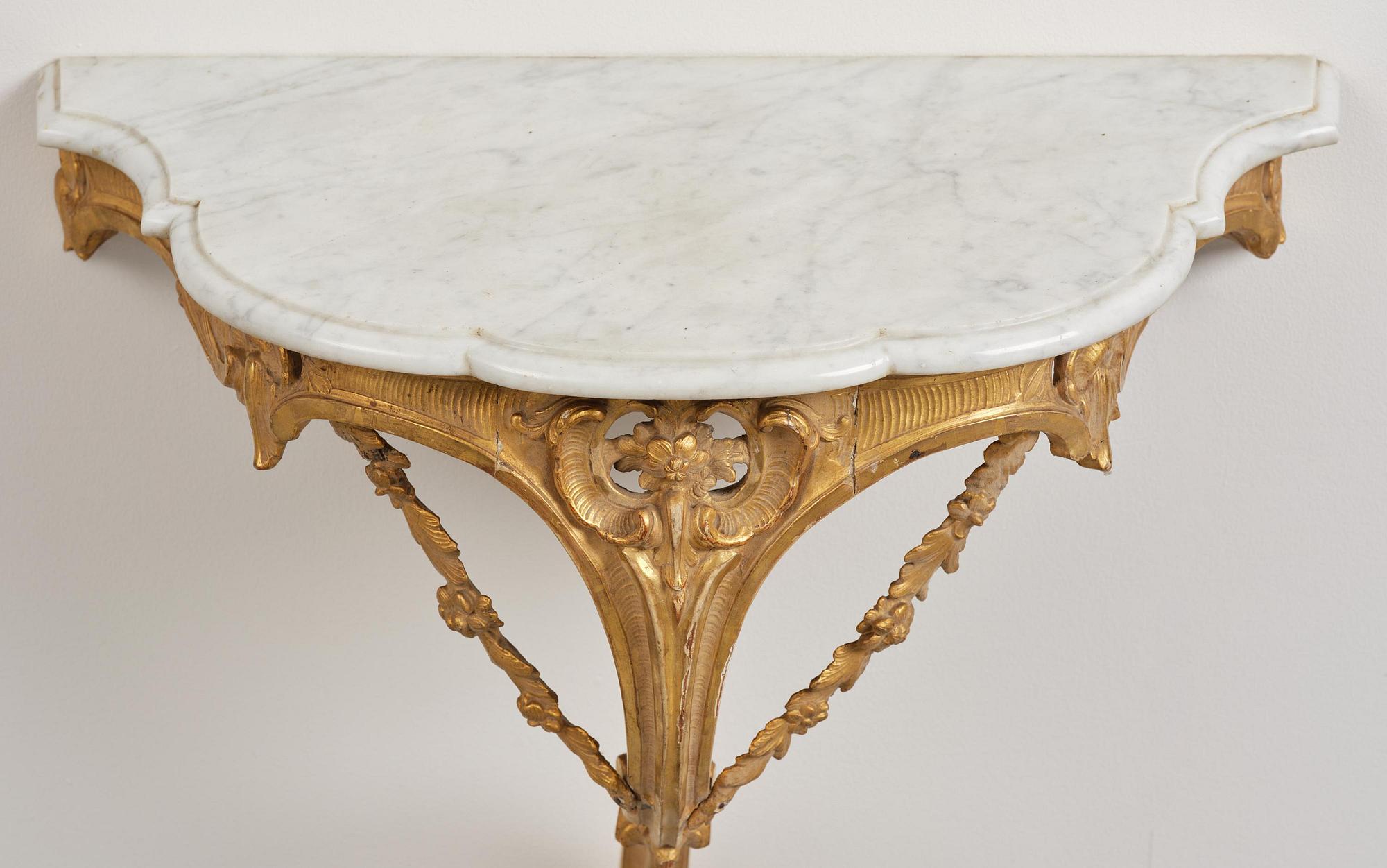 A rococo giltwood and marble console table, Stockholm, later part 18th century.