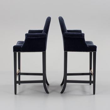 A pair of "The Simplified Moonback Counter Height Stool" barstools by Soane Britain.