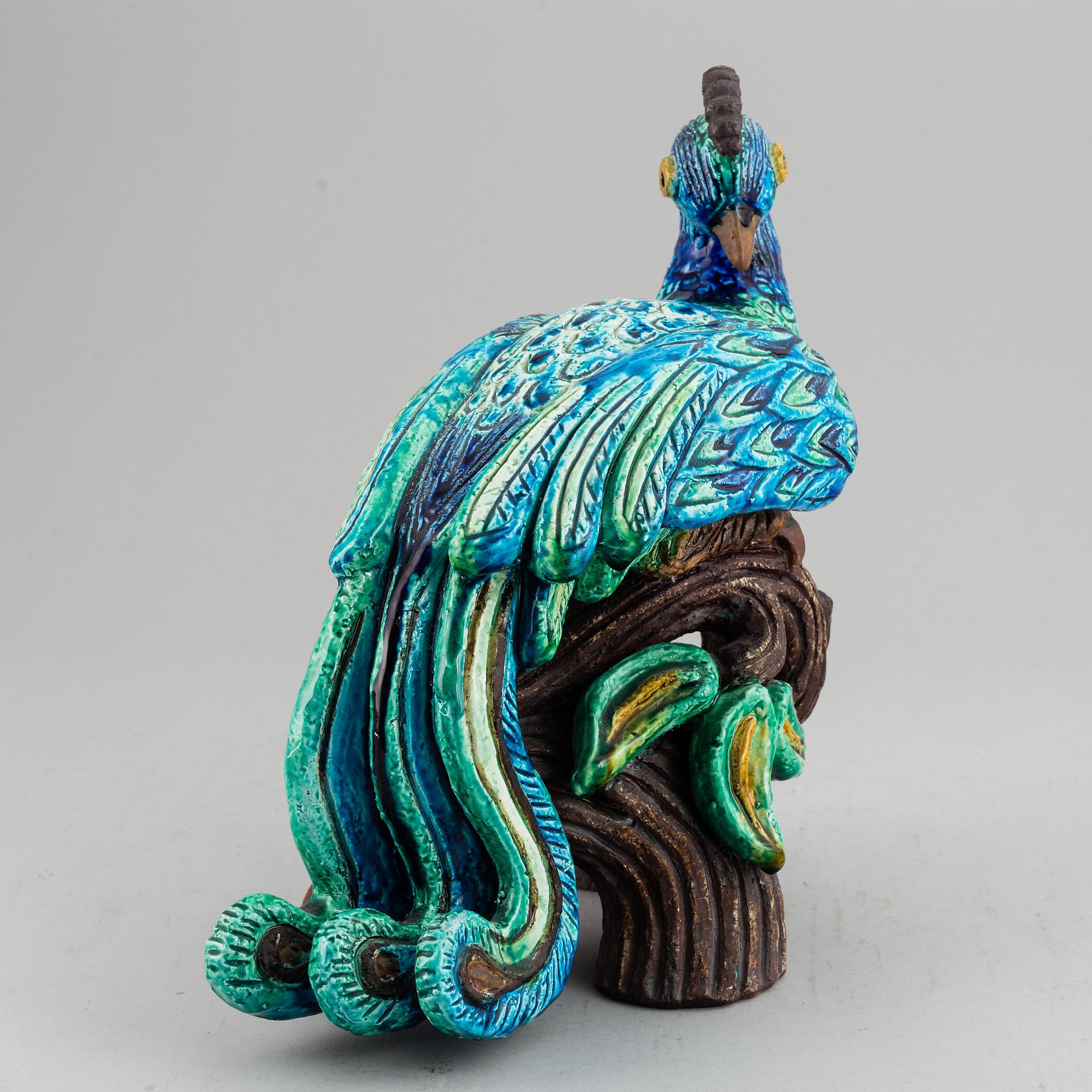 GUNNAR NYLUND, a stoneware figurine of a peacock, Rörstrand.