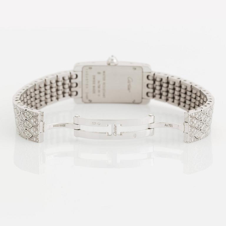 Cartier damarmbandsur "Tank Américane" 18K vitguld med runda briljantslipade diamanter.