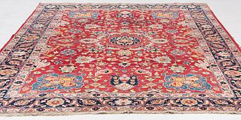 A semi-antique Tabriz carpet, c 358 x 248 cm.