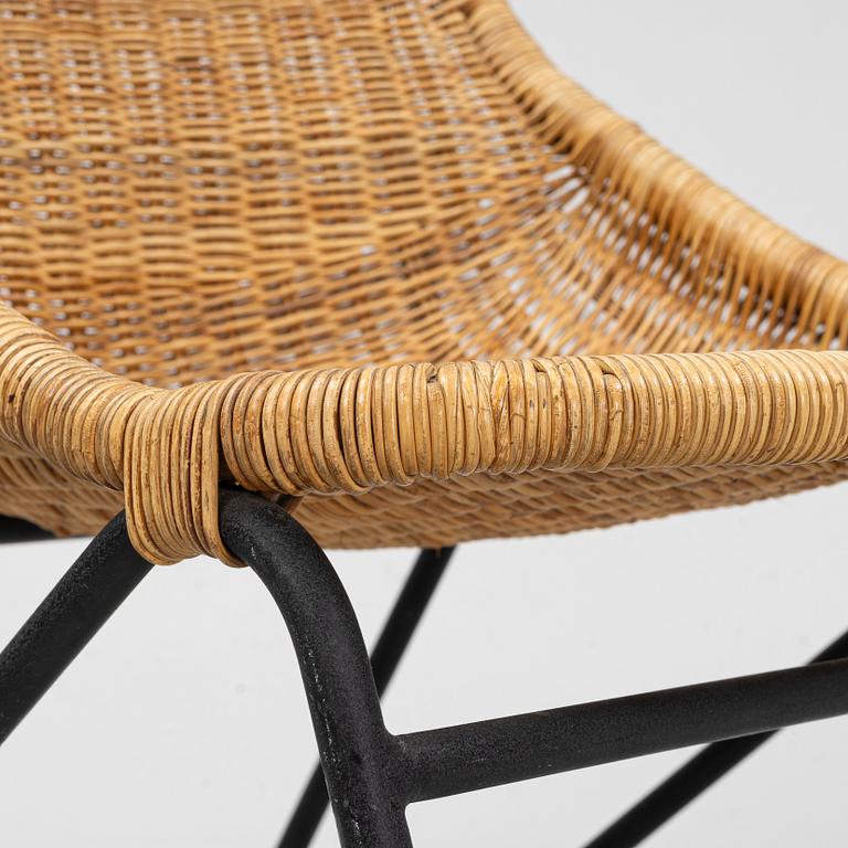 A rattan chair with ottoman, 1950's.
