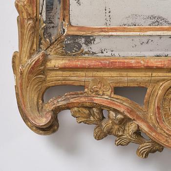 A Swedish Rococo mirror, 18 th century.