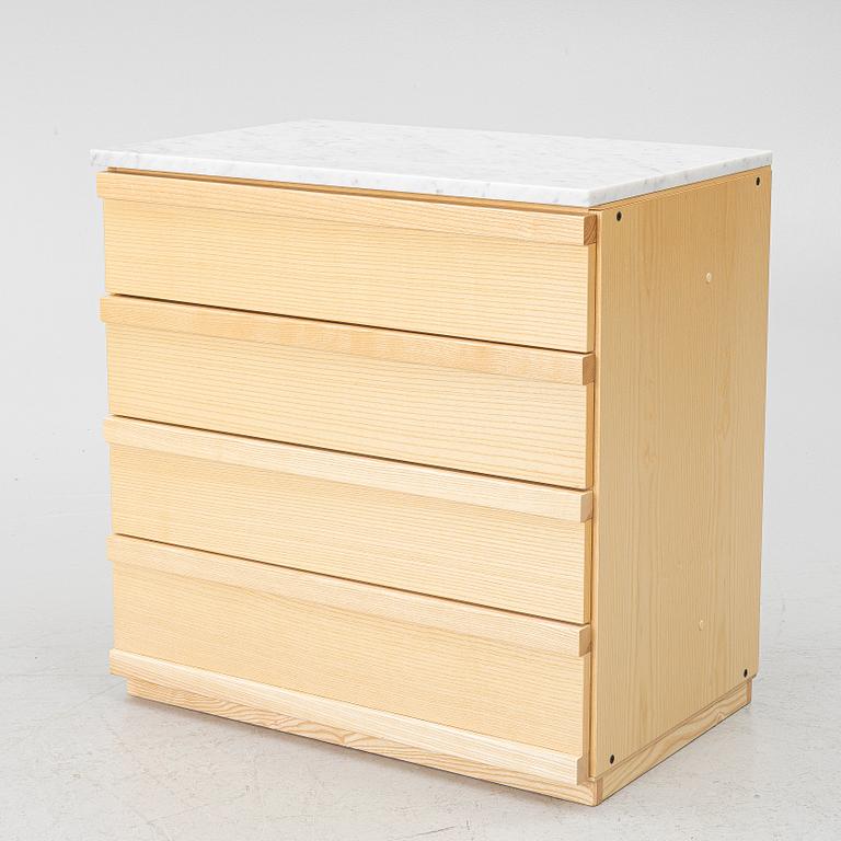 A contemporary chest of drawers.