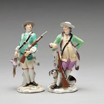 Two Meissen porcelain figures of huntsmen, 18th Century.