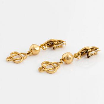 Oscar De La Renta clip earrings.