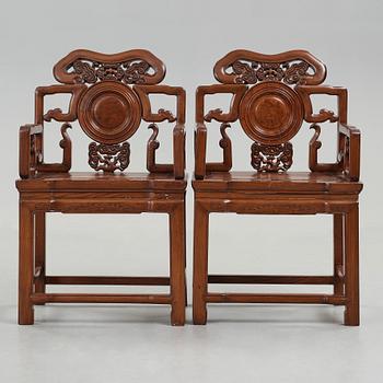 A pair of hardwood armchairs, Qing dynasty (1644-1912).