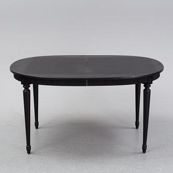 A painted Gustavian style dining table, second half of the 20th Century.