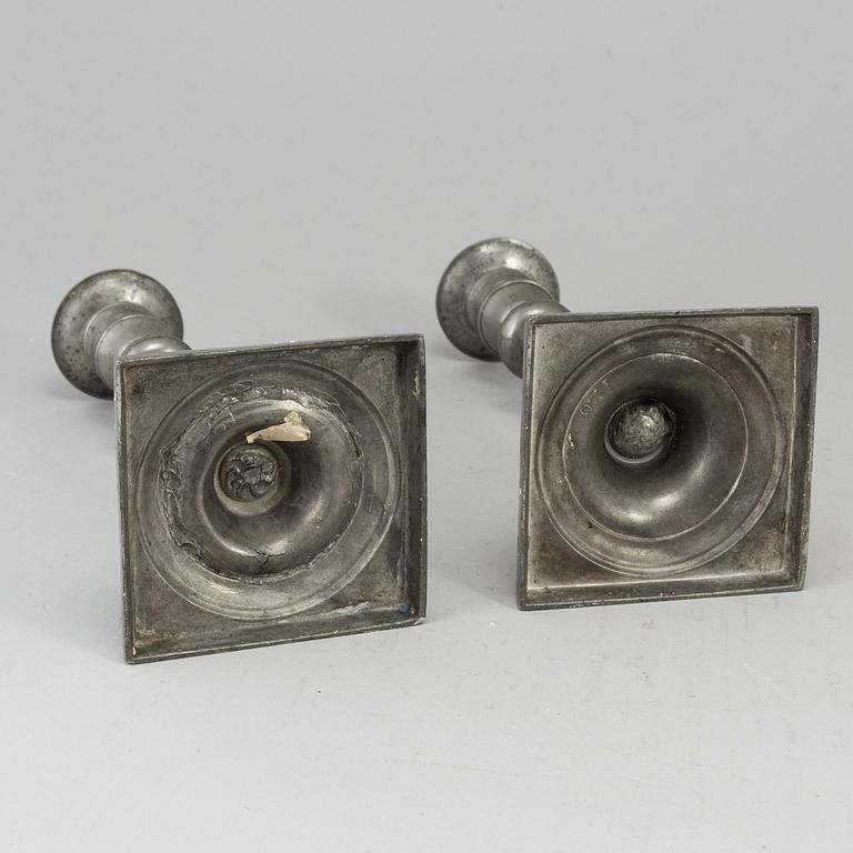 A pair of empire pewter candlesticks, first half of the 19th century.