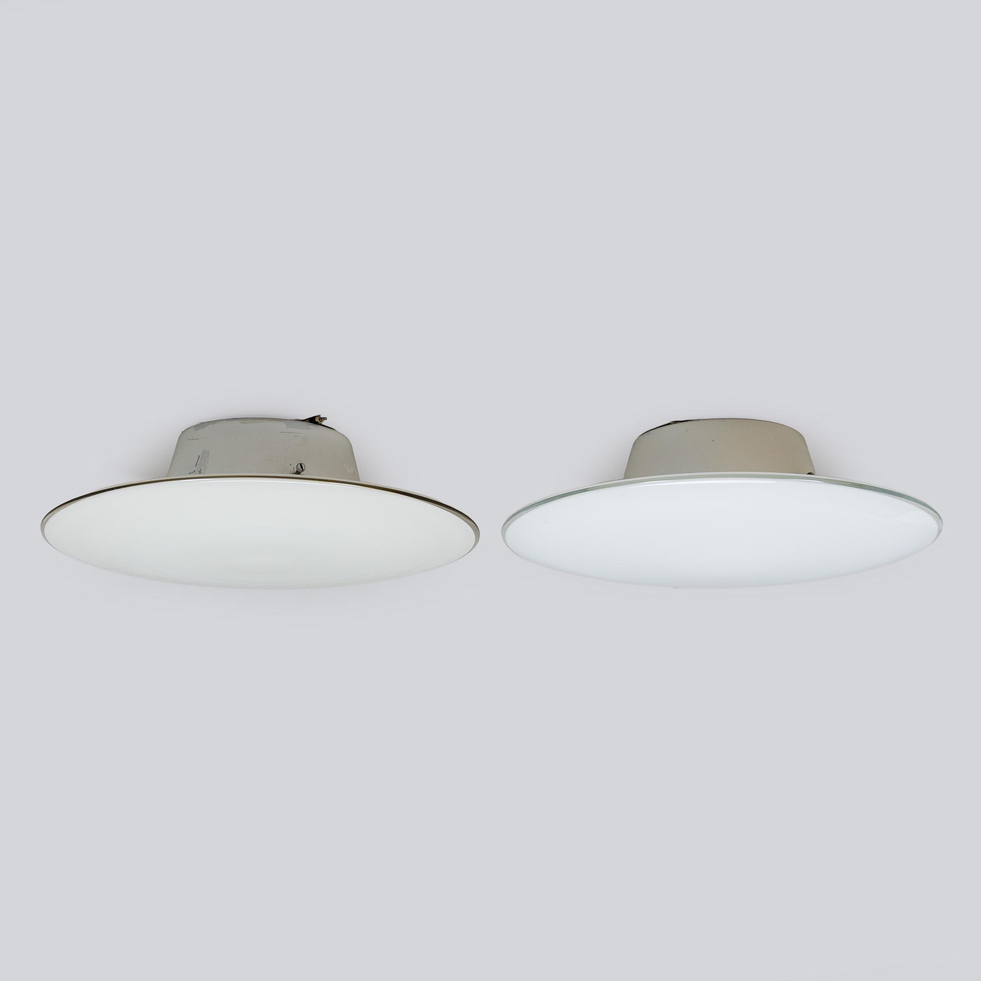Arne Jacobsen, a pair of 1960's 'AJ-Eklipta' ceiling/wall lamps, for Louis Poulsen/licensed manufacturer Orno, Stockmann.