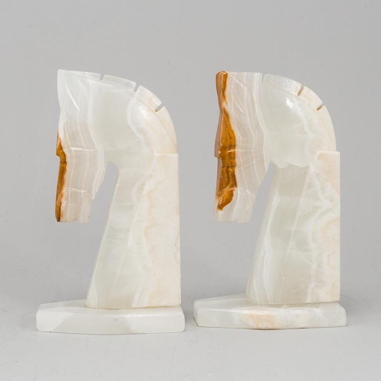A pair of stone book ends.