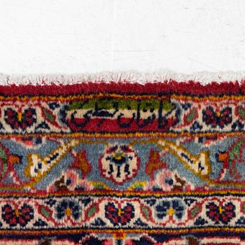 A Keshan carpet, central Iran, signed c, 392 x 301 cm.