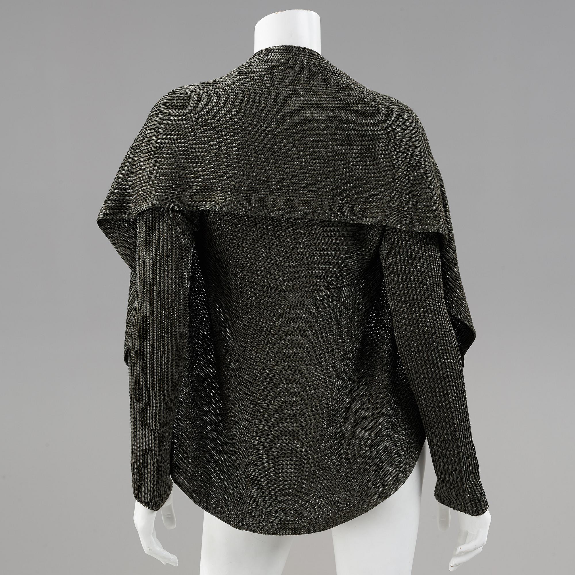 Two cardigans and a silkblouse by Ralph Lauren.