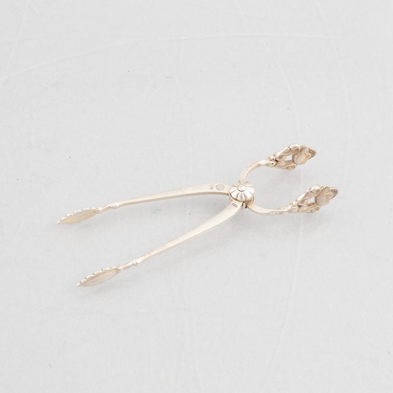 Sugar box, silver 830, Swedish import mark, and sugar tongs, sterling silver, Georg Jensen, Denmark.
