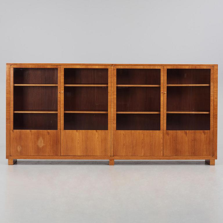 Carl Malmsten, a walnut bookcase, Sweden, 1930s.