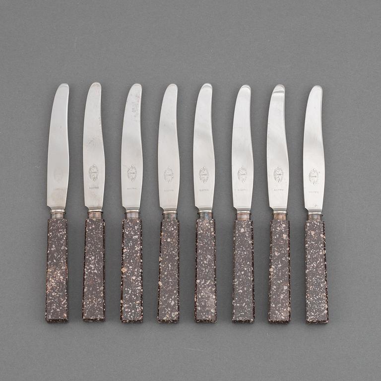 A set of eight porphyr knives, early 20th century.