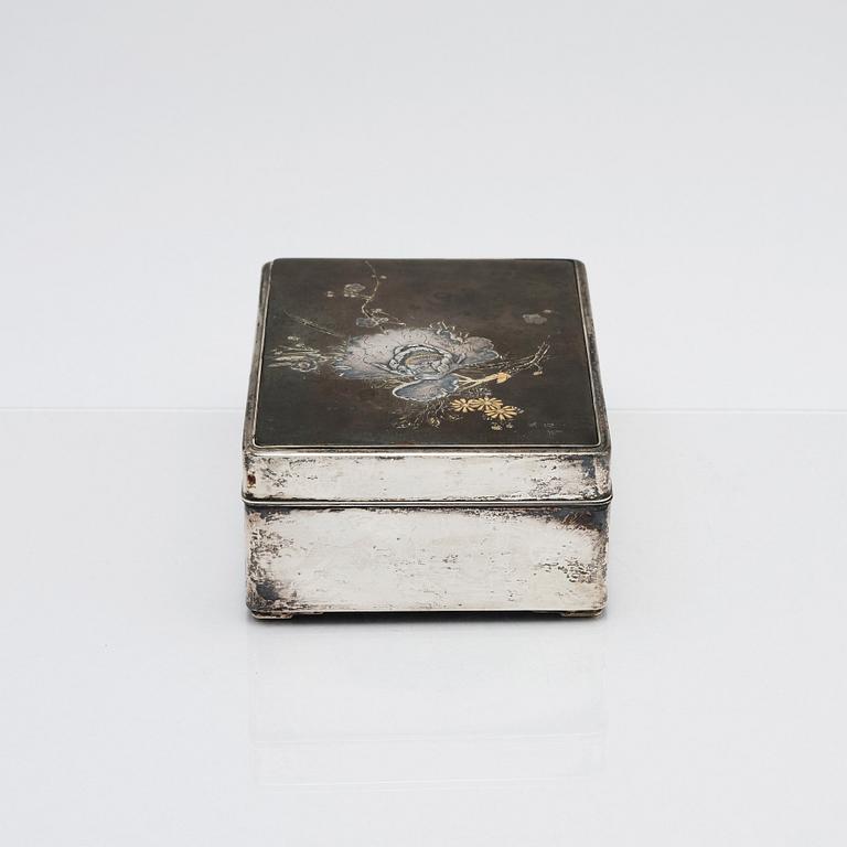 A Japanese silver box, early 20th century.