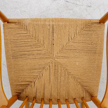 Hans J Wegner, gungstol, "J 16". FDB Möbler, 1900-talets andra hälft.