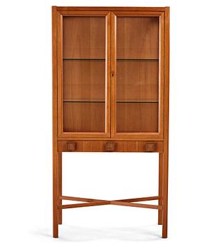 324. Sten Blomberg, a mahogany showcase cabinet, executed by the workshop of cabinet maker Alfred Persson, 1950-60's,