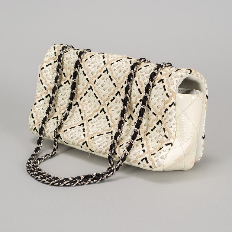 A white Chanel bag, 2010-2011.