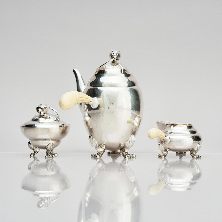 Georg Jensen, a three pieces coffee service in sterling silver, "Magnolia/Blossom", Copenhagen 1933-44.