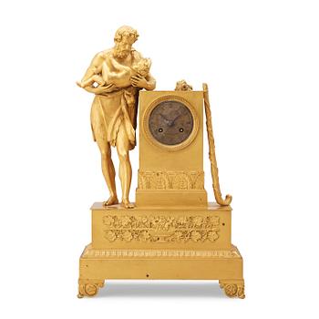 A French Empire early 19th century gilt bronze mantel clock.