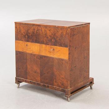 A 1930s Bodafors birch bar cabinet.