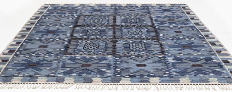 Barbro Nilsson, a carpet, "Nejlikan blå", flat weave, ca 315 x 272 cm, signed AB MMF BN.