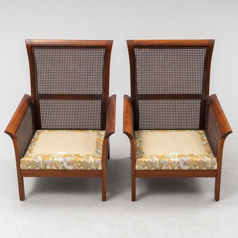 Arne Norell, a pair of 'Rotang' easy chairs, Norell Möbel AB, Sweden.