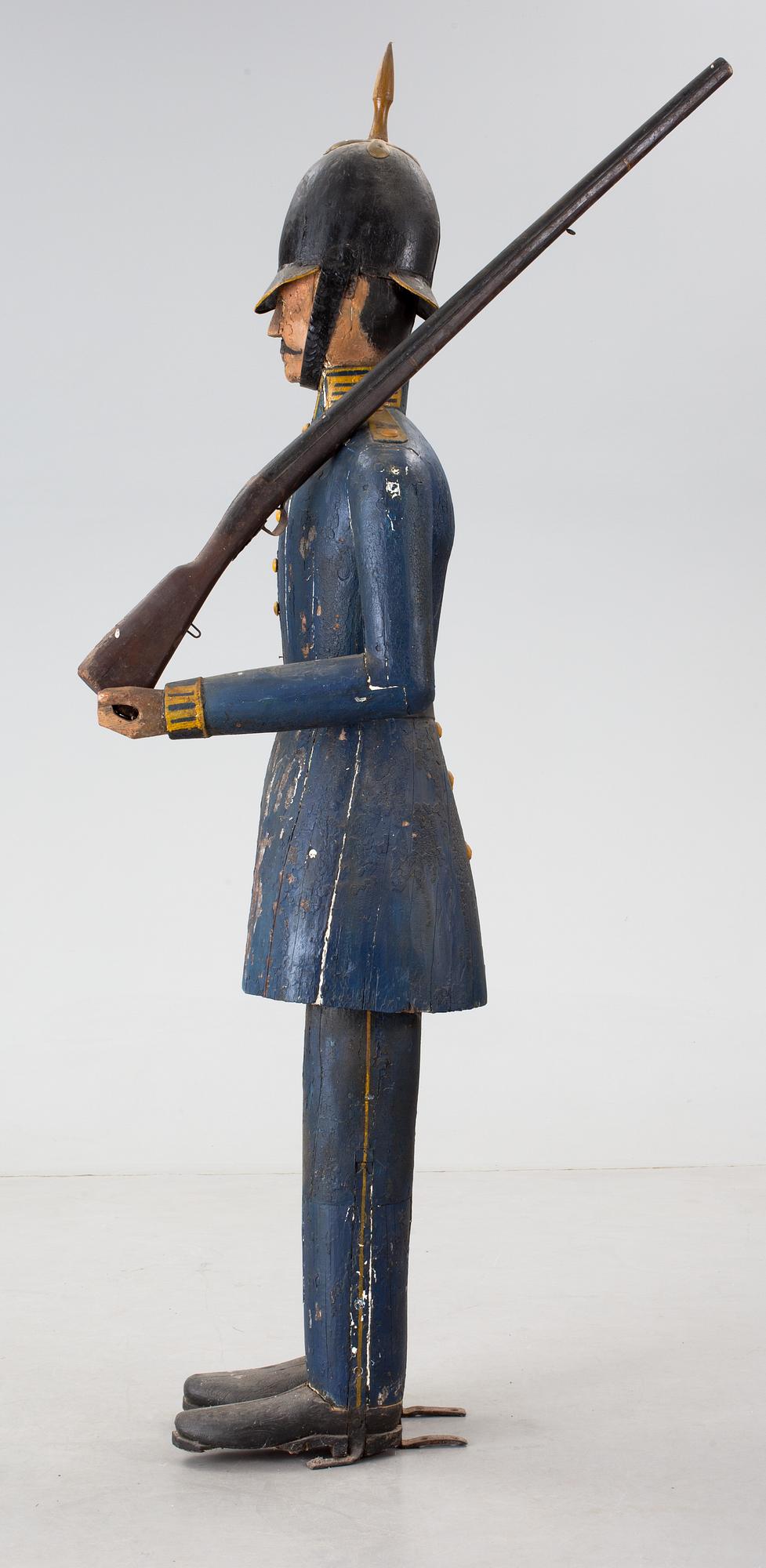 A Swedish 19th Century wooden sculpture.