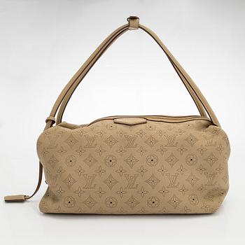 Louis Vuitton, a 'Mahina Galatea MM' bag.