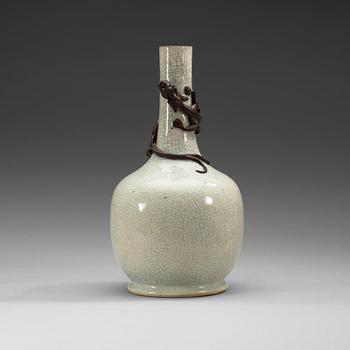 1668. A ge-glazed vase with a dragon, China, 20th Century.