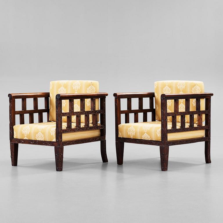 A pair of Chinese arm-chairs, 1920's.