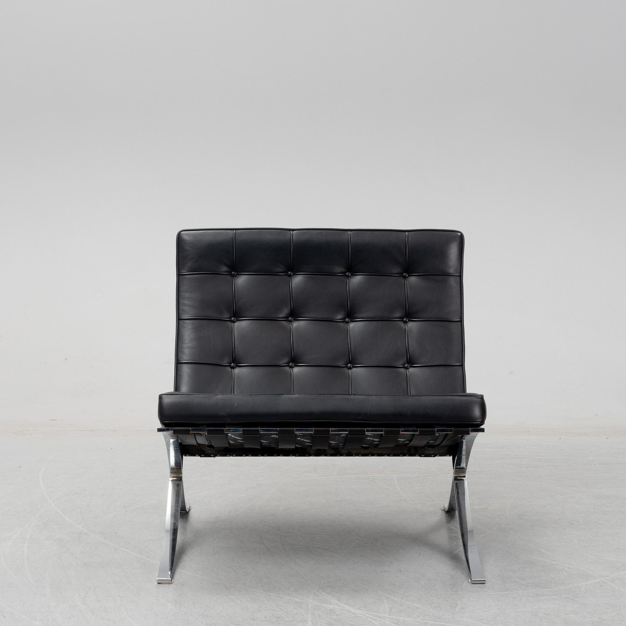 LUDWIG MIES VAN DER ROHE, a 'Barcelona' black leather lounge chair, Knoll Studio.