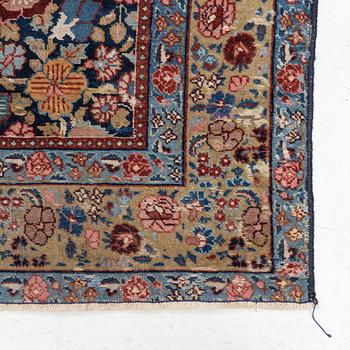 A rug, possibly Tabriz, c. 195 x 137 cm.