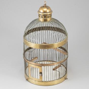 A 19th century brass bird cage.