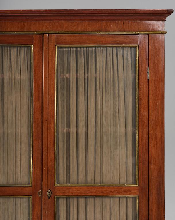 A late Gustavian mahogany bibliothéque, Stockholm, late 18th century.