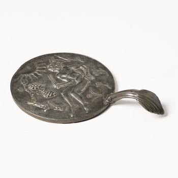 Nils Fougstedt, a pewter hand mirror model A 508, Firma Svenskt Tenn, Stockholm, 1920s-30s.