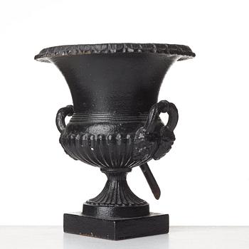 A Louis XVI-style garden urn, circa 1900.